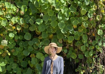 Standing in front of a massive wall of nasturtiums in Mendocino, CA is YA Author Annie Fox and Gracie the Dog. Fans of E. Lockhart's We Were Liars and young adult amnesia mysteries with unreliable narrators who can't remember the most important thing that happened to them: here's a new book for your TBR, “The Little Things That Kill: A Teen Friendship Afterlife Apology Tour”