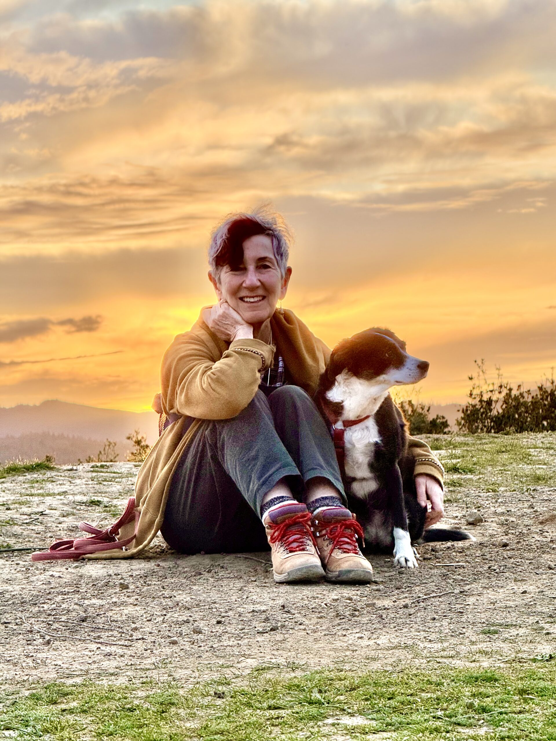 Annie Fox and Gracie the Dog at sunset